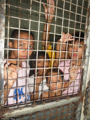 children caged kept philippines visit locked abused police abuse detained centers detention asia street orphans catholic homeless where pope francis