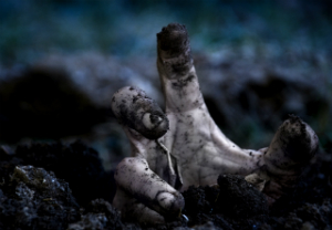 zombie crawling out of grave
