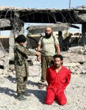 ISIS child fighter executes handcuffed prisoner as ISIS boasts new ...