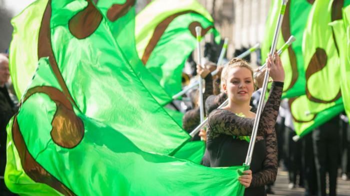 Hundreds of performers and puppets appear for London's St. Patrick's parade.