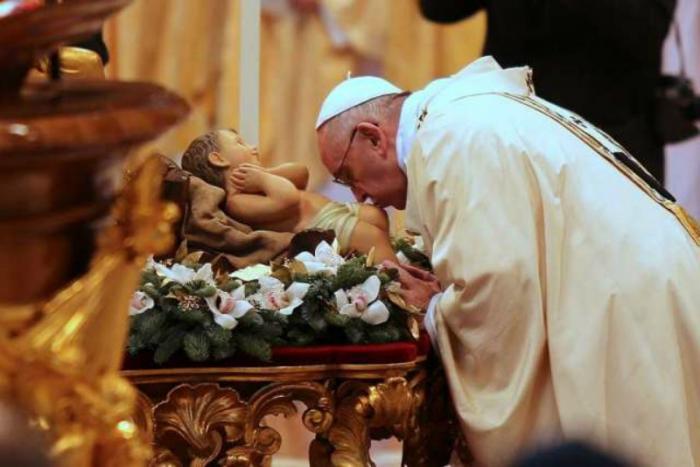 Pope Francis celebrates Epiphany Mass at St. Peter's Basilica.