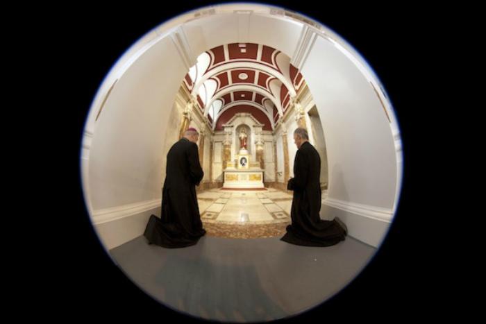 Archbishop Leo Cushley and Father Joe McAuley at the tomb of The Venerable Margaret Sinclair in St Patrick's Church, Cowgate, Edinburgh.